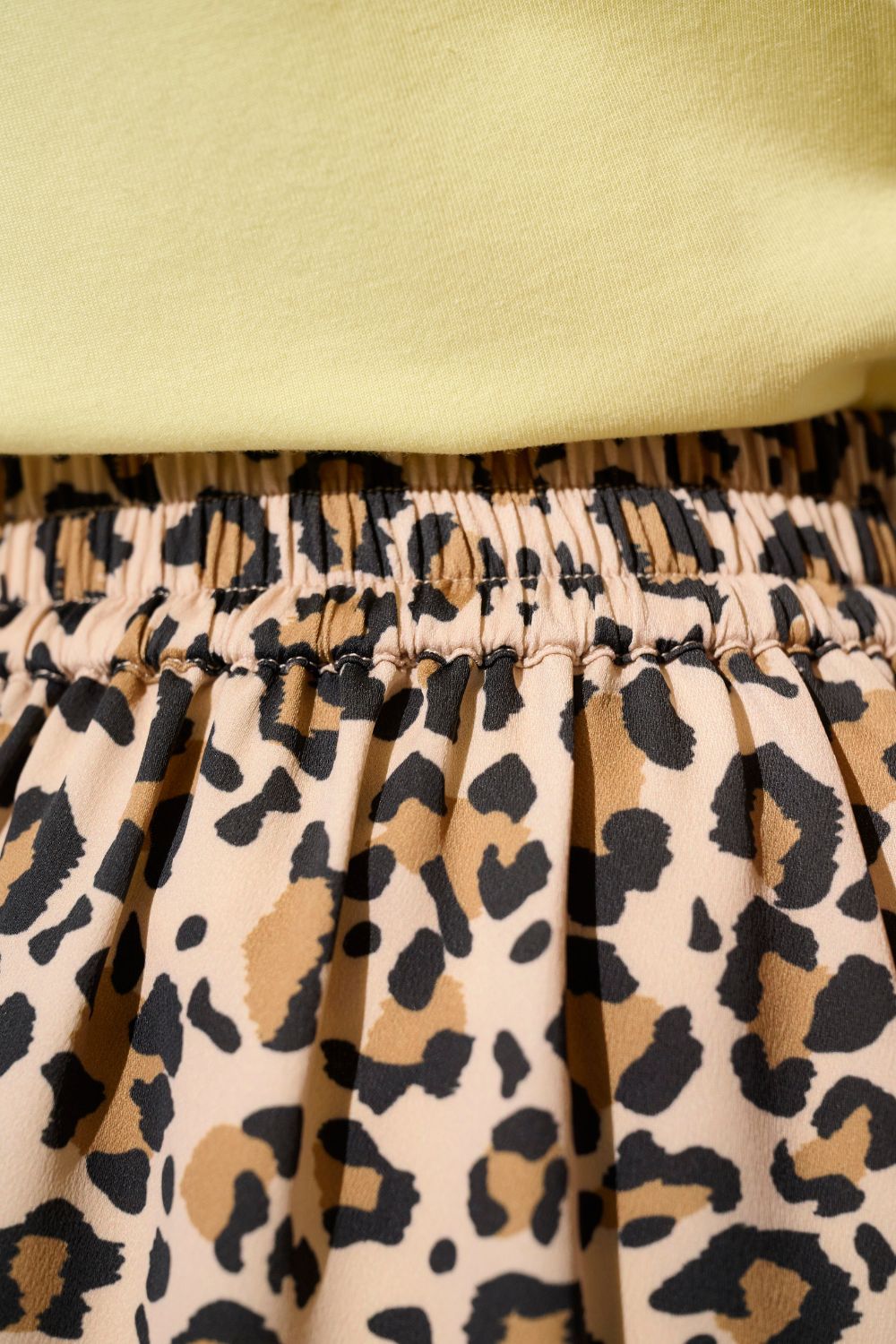 Jupe anti-UV - Positano à motif léopard, tissu léger et confortable, idéale pour la protection solaire quotidienne.