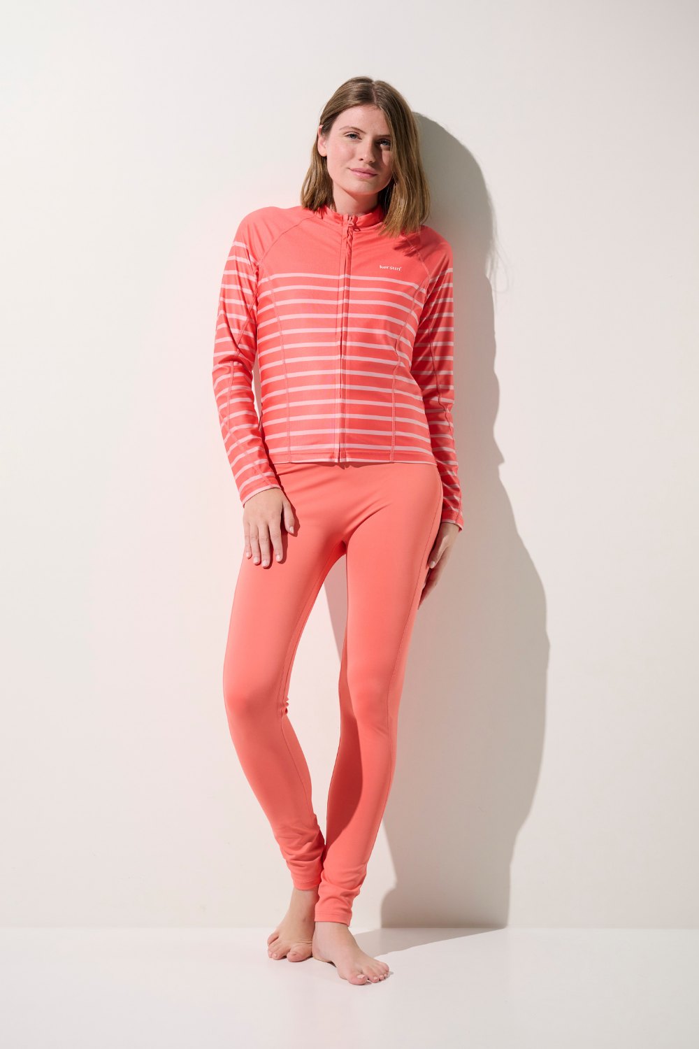 Veste de bain anti-UV - Moorea en rose rayé pour femme, légère et confortable, idéale pour la baignade.