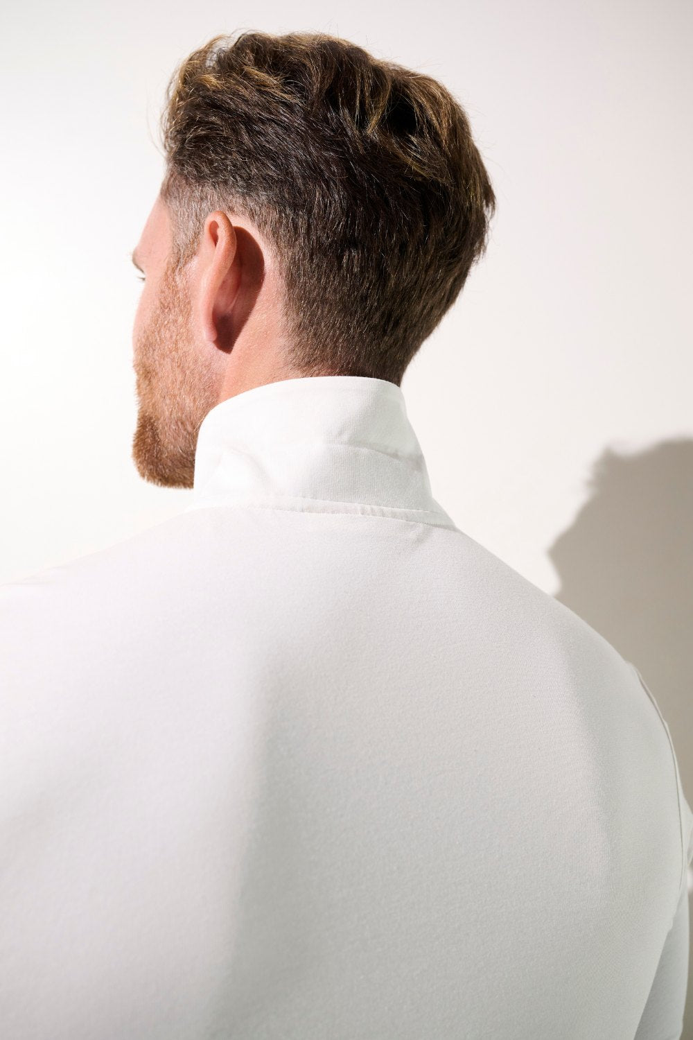 Polo anti-UV - Saint-Malo blanc pour homme, élégant avec protection solaire UPF 50+ et tissu léger.