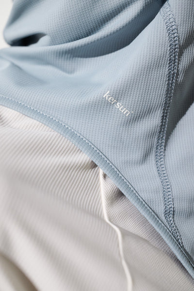 Cagoule visière anti-UV - Ventoux en bleu clair, légère et respirante, marque Ker Sun pour protection solaire.
