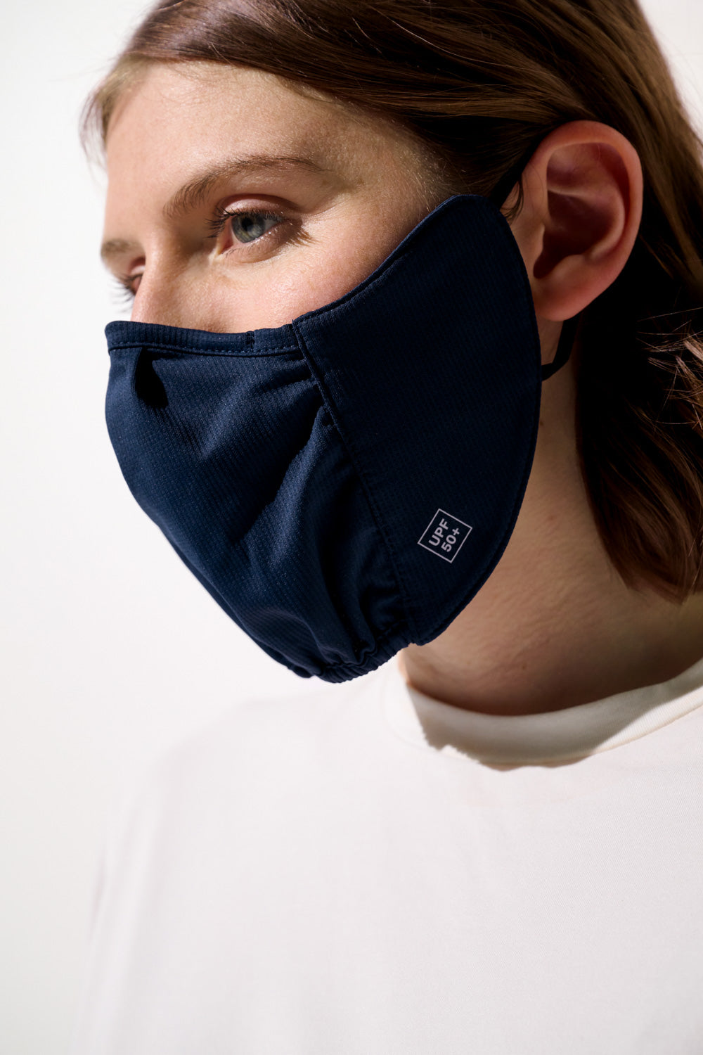 Masque anti-UV - Mojave pour femme, en tissu léger et respirant, coloris bleu marine pour un confort optimal.