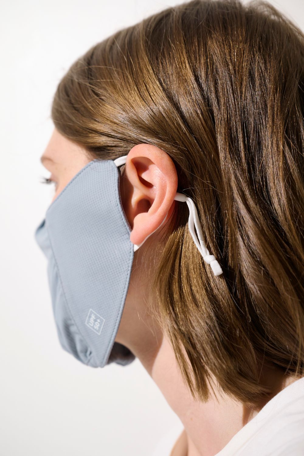 Masque anti-UV - Mojave pour femme, ajustable et respirant, offrant une protection solaire optimale.
