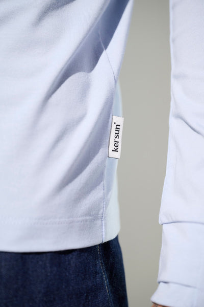 Polo anti-UV - Saint-Malo bleu clair pour homme, avec étiquette Ker Sun, léger et élégant pour protection solaire.