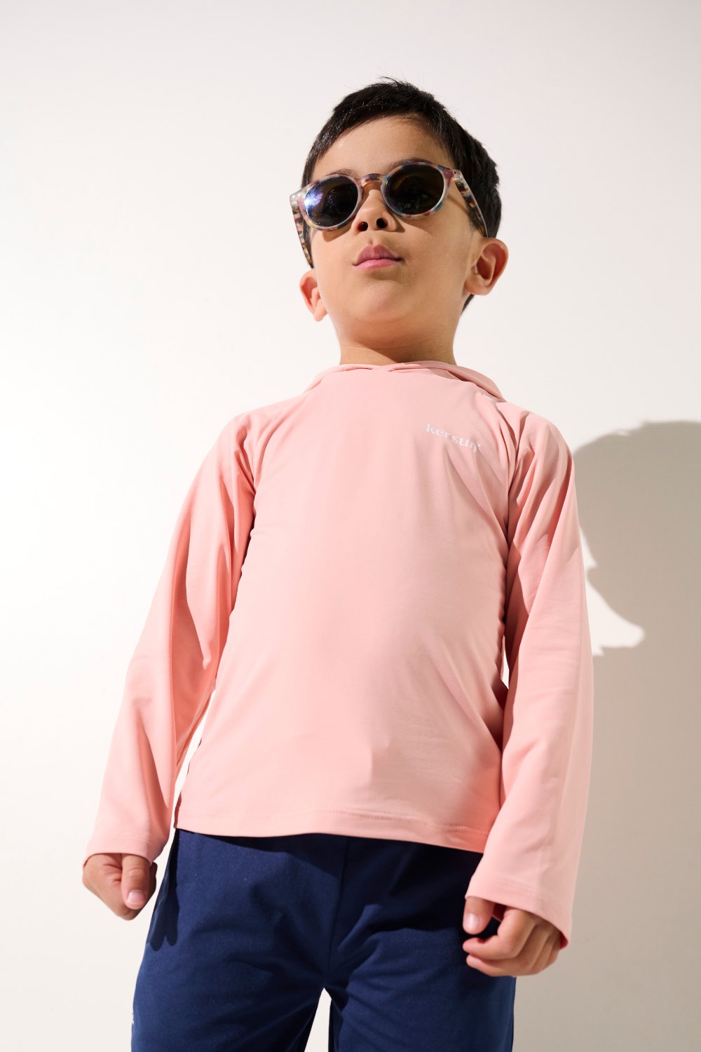 T-shirt anti-UV à capuche - Oasis, rose pour enfant, respirant et élégant, UPF 50+ pour protection solaire.