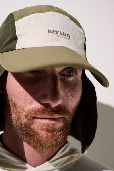 Casquette anti-UV Sequoia Ker Sun, homme portant une casquette olive UPF 50+ pour protection solaire.