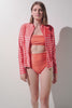 Veste de bain anti-UV - Moorea en rayures orange pour femme, légère et respirante, idéale pour baignades et soleil.