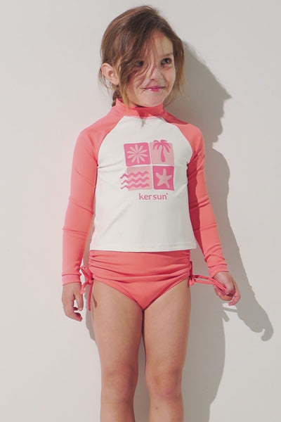 T-shirt de bain anti-UV - Pacific pour enfant, manches longues, léger, UPF 50+, couleur corail, idéal pour les activités aquatiques.