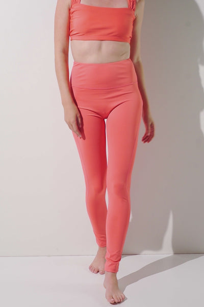 Legging de bain anti-UV Galápagos orange pour femme, léger et extensible, idéal pour activités aquatiques avec protection UPF 50+.