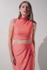 Haut de maillot de bain anti-UV - Malta, femme en crop top orange, élégant et léger pour une protection solaire optimale.