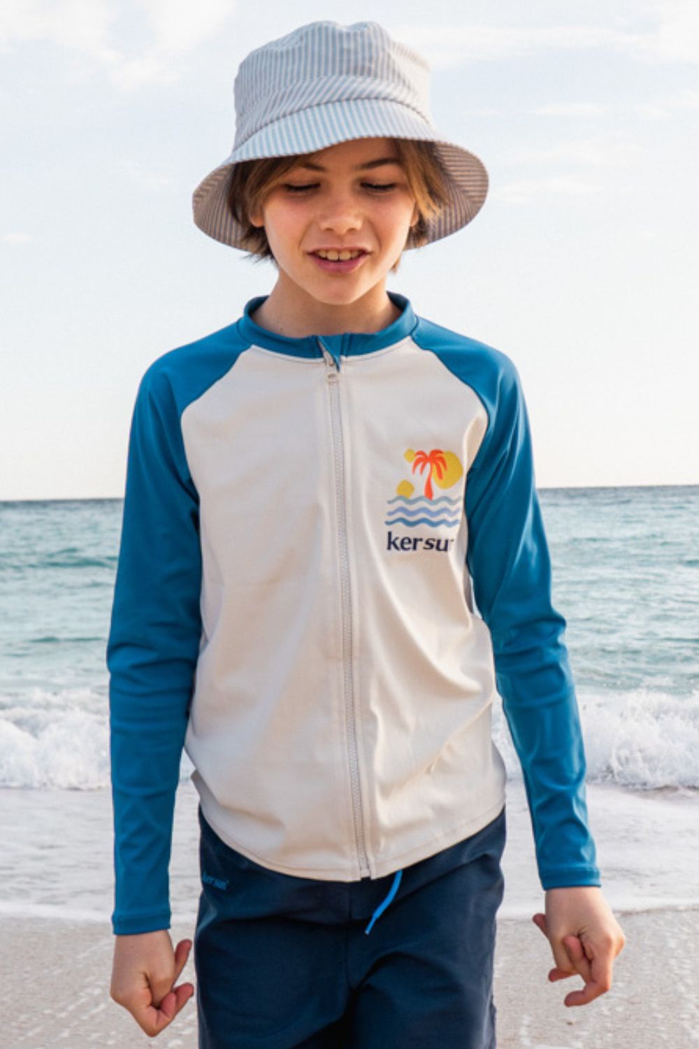 Veste de bain anti-UV - Fidji pour enfant, manches longues et tissu léger, idéale pour la plage avec protection UPF 50+.